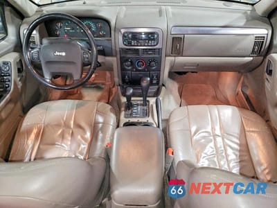 Zdjęcie 8 z 12 samochodu: 2002 JEEP GRAND CHEROKEE LAREDO VIN:1J4GW48N02C278400 - miniatura