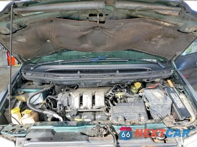 Zdjęcie 12 z 13 samochodu: 1999 DODGE GRAND CARAVAN SE VIN:2B4GP44R6XR215079 - miniatura