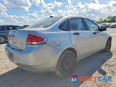 Trzecie zdjęcie samochodu z tyłu: 2009 FORD FOCUS S VIN:1FAHP34N19W102719 - miniatura