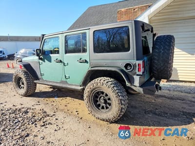 Drugie zdjęcie samochodu z przodu: 2014 JEEP WRANGLER UNLIMITED SAHARA VIN:1C4HJWEG8EL117971 - miniatura