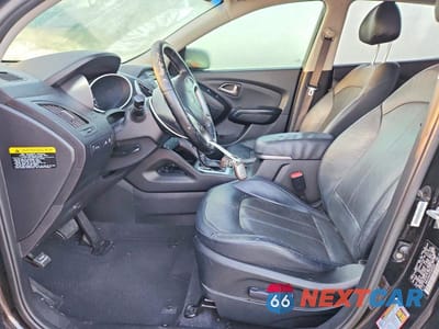 Zdjęcie 7 z 12 samochodu: 2014 HYUNDAI TUCSON LIMITED VIN:KM8JU3AG7EU806936 - miniatura