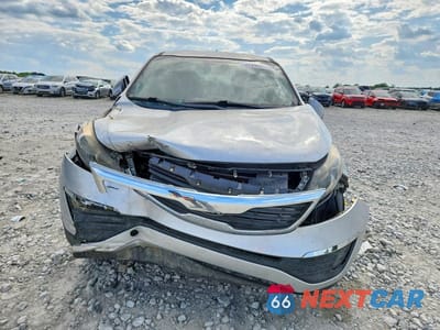 Piąte zdjęcie samochodu w środku: 2013 KIA SPORTAGE LX VIN:KNDPBCA27D7394636 - miniatura