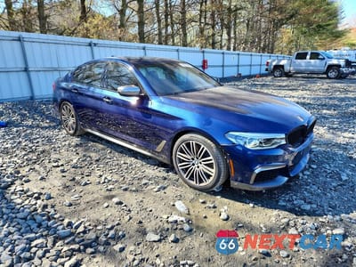 Czwarte zdjęcie samochodu z boku: 2018 BMW M550XI VIN:WBAJB9C50JB286865 - miniatura
