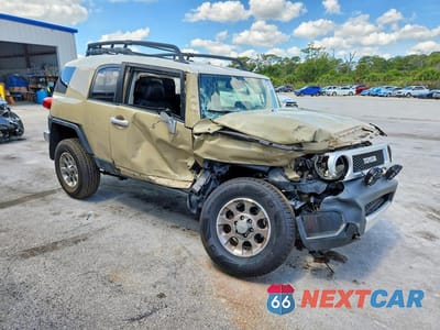 Czwarte zdjęcie samochodu z boku: 2012 TOYOTA FJ CRUISER BASE VIN:JTEBU4BF4CK145682 - miniatura