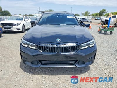 Piąte zdjęcie samochodu w środku: 2019 BMW 330I VIN:WBA5R1C5XKAJ98833 - miniatura