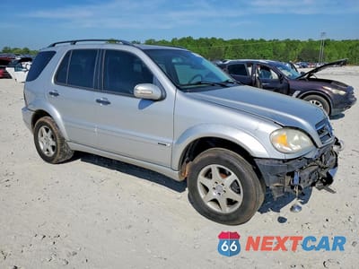 Czwarte zdjęcie samochodu z boku: 2002 MERCEDES-BENZ ML 500 VIN:4JGAB75E72A324616 - miniatura