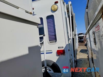 Czwarte zdjęcie samochodu z boku: 2003 KEYSTONE COUGAR CAMPER VIN:4YDF2762032034726 - miniatura