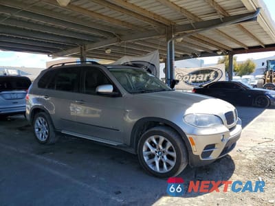 Czwarte zdjęcie samochodu z boku: 2011 BMW X5 XDRIVE35I VIN:5UXZV4C54BL738911 - miniatura