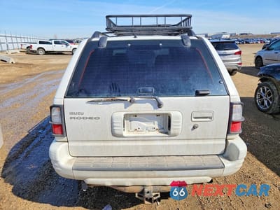 Zdjęcie 6 z 12 samochodu: 2002 ISUZU RODEO S VIN:4S2DM58W824700666 - miniatura
