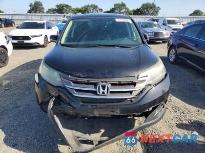 Piąte zdjęcie samochodu w środku: 2014 HONDA CR-V LX VIN:2HKRM3H35EH522242 - miniatura