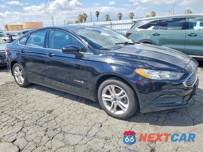 Czwarte zdjęcie samochodu z boku: 2018 FORD FUSION SE HYBRID VIN:3FA6P0LU5JR103037 - miniatura