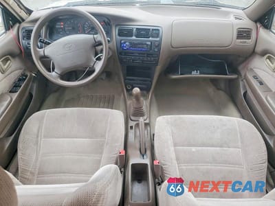 Zdjęcie 8 z 12 samochodu: 1996 TOYOTA COROLLA DX VIN:2T1BB02E5TC170330 - miniatura