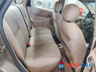 Zdjęcie 10 z 12 samochodu: 2004 FORD FOCUS SE COMFORT VIN:1FAFP34314W146542 - miniatura