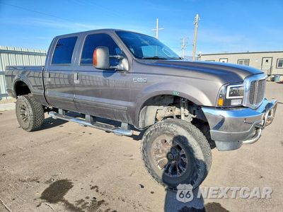 Czwarte zdjęcie samochodu z boku: 2003 FORD F250 SUPER DUTY VIN:1FTNW21L63EB70525 - miniatura