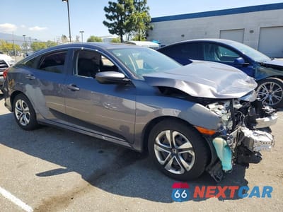 Czwarte zdjęcie samochodu z boku: 2018 HONDA CIVIC LX VIN:2HGFC2F54JH513511 - miniatura