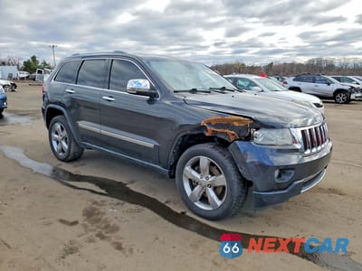 Czwarte zdjęcie samochodu z boku: 2011 JEEP GRAND CHEROKEE LIMITED VIN:1J4RR5GT9BC652282 - miniatura
