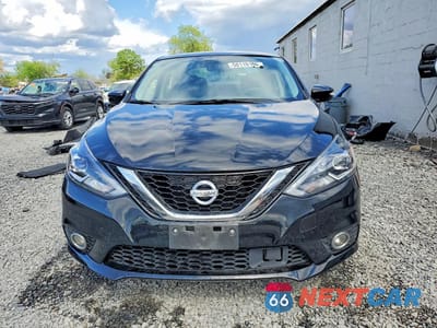 Piąte zdjęcie samochodu w środku: 2018 NISSAN SENTRA SR VIN:3N1AB7AP2JY214890 - miniatura