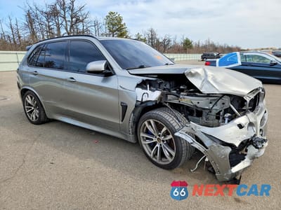 Czwarte zdjęcie samochodu z boku: 2016 BMW X5 M VIN:5YMKT6C58G0R79360 - miniatura