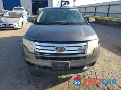 Piąte zdjęcie samochodu w środku: 2010 FORD EDGE SEL VIN:2FMDK4JC2ABB03931 - miniatura