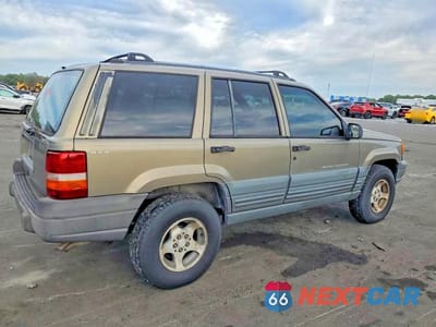 Trzecie zdjęcie samochodu z tyłu: 1997 JEEP GRAND CHEROKEE LAREDO VIN:1J4GZ58S7VC564865 - miniatura