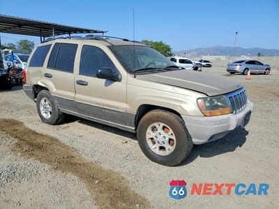 Czwarte zdjęcie samochodu z boku: 2000 JEEP GRAND CHEROKEE LAREDO VIN:1J4GW48S0YC388328 - miniatura