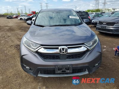 Piąte zdjęcie samochodu w środku: 2018 HONDA CR-V EXL VIN:7FARW2H87JE007658 - miniatura