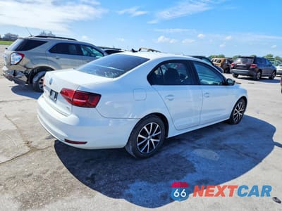 Trzecie zdjęcie samochodu z tyłu: 2016 VOLKSWAGEN JETTA SE VIN:3VWD67AJ0GM217682 - miniatura