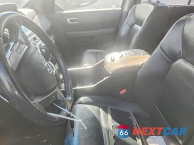 Zdjęcie 7 z 13 samochodu: 2010 HONDA PILOT TOURING VIN:5FNYF4H98AB504200 - miniatura