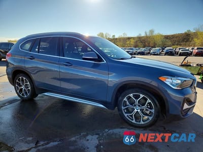 Czwarte zdjęcie samochodu z boku: 2020 BMW X1 SDRIVE28I VIN:WBXJG7C01L5P35682 - miniatura