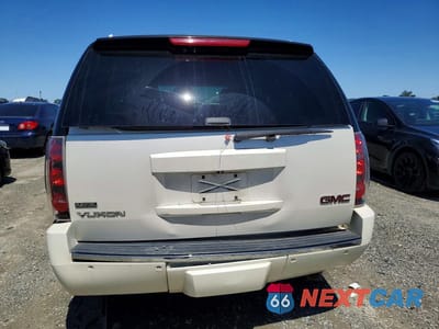 Zdjęcie 6 z 13 samochodu: 2011 GMC YUKON DENALI VIN:1GKS2EEFXBR349120 - miniatura