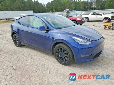 Czwarte zdjęcie samochodu z boku: 2022 TESLA MODEL Y VIN:7SAYGDEE0NF517319 - miniatura