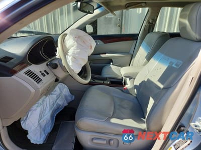 Zdjęcie 7 z 12 samochodu: 2011 TOYOTA AVALON BASE VIN:4T1BK3DBXBU434188 - miniatura