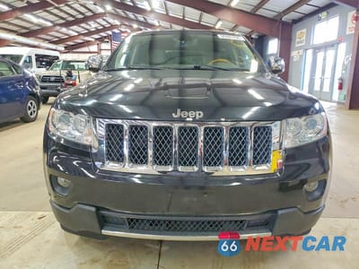 Piąte zdjęcie samochodu w środku: 2011 JEEP GRAND CHEROKEE OVERLAND VIN:1J4RR6GT4BC560485 - miniatura