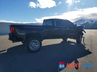 Trzecie zdjęcie samochodu z tyłu: 2021 GMC SIERRA K3500 DENALI VIN:1GT49WEY0MF202901 - miniatura