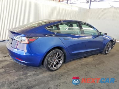 Trzecie zdjęcie samochodu z tyłu: 2023 TESLA MODEL 3 VIN:5YJ3E1EA0PF448580 - miniatura