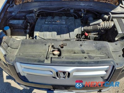 Zdjęcie 12 z 12 samochodu: 2006 HONDA PILOT EX VIN:2HKYF18506H564721 - miniatura