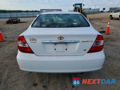 Zdjęcie 6 z 12 samochodu: 2002 TOYOTA CAMRY XLE V6 VIN:JTDBF30K720001725 - miniatura