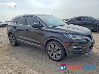 Czwarte zdjęcie samochodu z boku: 2015 LINCOLN MKC VIN:5LMTJ2AH9FUJ42478 - miniatura