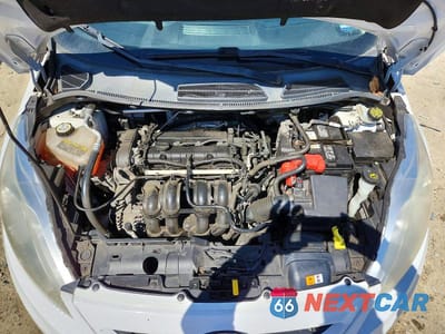 Zdjęcie 12 z 13 samochodu: 2013 FORD FIESTA VIN:3FADP4EJXDM107023 - miniatura