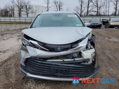 Piąte zdjęcie samochodu w środku: 2021 TOYOTA SIENNA LE 8-PASSENGER VIN:5TDKRKECXMS014343 - miniatura