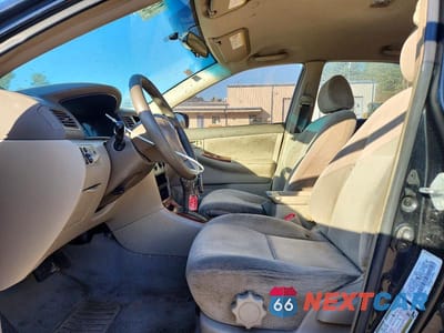 Zdjęcie 7 z 11 samochodu: 2004 TOYOTA COROLLA LE VIN:2T1BR32E14C295145 - miniatura