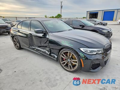 Czwarte zdjęcie samochodu z boku: 2021 BMW M340I VIN:3MW5U7J04M8C09266 - miniatura