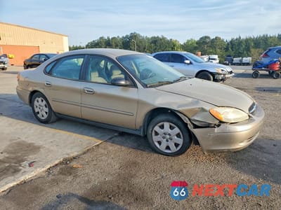 Czwarte zdjęcie samochodu z boku: 2001 FORD TAURUS LX VIN:1FAFP52U91A289612 - miniatura