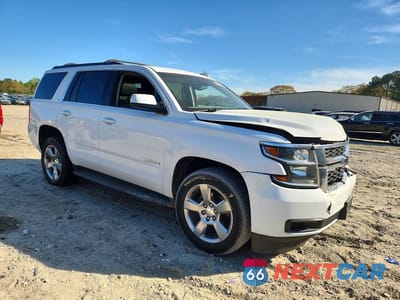 Czwarte zdjęcie samochodu z boku: 2018 CHEVROLET TAHOE K1500 LT VIN:1GNSKBKC9JR197146 - miniatura