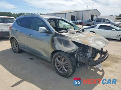 Czwarte zdjęcie samochodu z boku: 2015 HYUNDAI TUCSON SE VIN:KM8JU3AG9FU088341 - miniatura