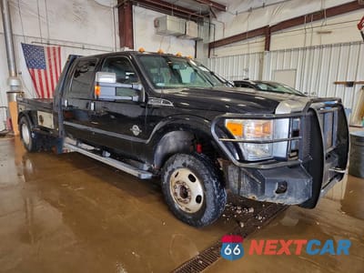 Czwarte zdjęcie samochodu z boku: 2016 FORD F350 SUPER DUTY VIN:1FT8W3DT0GEC50200 - miniatura