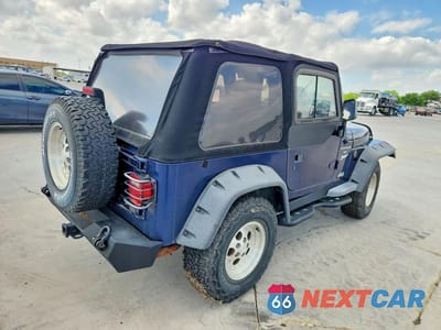 Trzecie zdjęcie samochodu z tyłu: 1997 JEEP WRANGLER / TJ SPORT VIN:1J4FY19S3VP505522 - miniatura