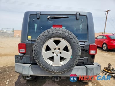 Zdjęcie 6 z 12 samochodu: 2012 JEEP WRANGLER SPORT VIN:1C4AJWAG9CL270587 - miniatura