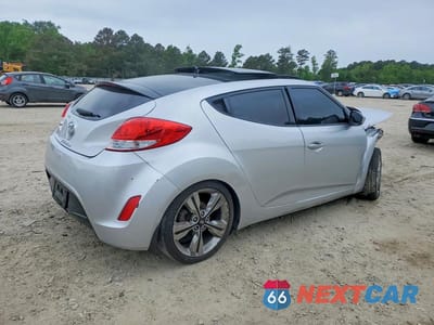 Trzecie zdjęcie samochodu z tyłu: 2016 HYUNDAI VELOSTER BASE VIN:KMHTC6AD9GU282582 - miniatura