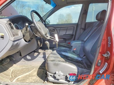 Zdjęcie 7 z 11 samochodu: 2003 HYUNDAI ELANTRA GT VIN:KMHDN55DX3U083523 - miniatura